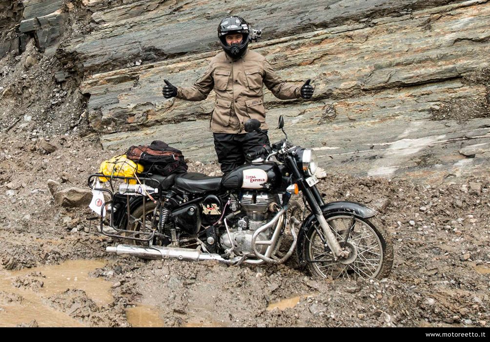 motoreetto in the mud of rohtang pass ladakh himalaya