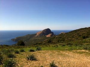 corsica in moto motoreetto capo rosso